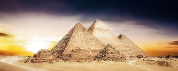 istock Great Pyramids of Giza, Egypt, at sunset 1411135236