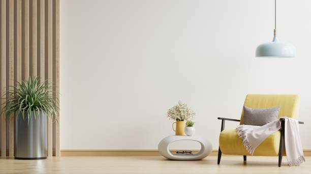 istock Modern minimalist interior with an yellow armchair on empty white wall background. 1411139794