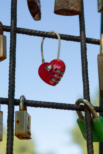 istock Love padlocks representing ever lasting love. Red heart love lock. 1411140600