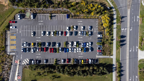 istock Parking lot surrounded by landscaping in urban environment 1411144987