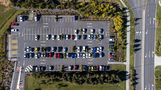 Parking lot surrounded by landscaping in urban environment on the Gold Coast, Australia