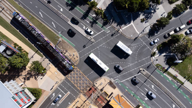 istock Light Rail Station and Busy Intersection From Directly Above 1411145266