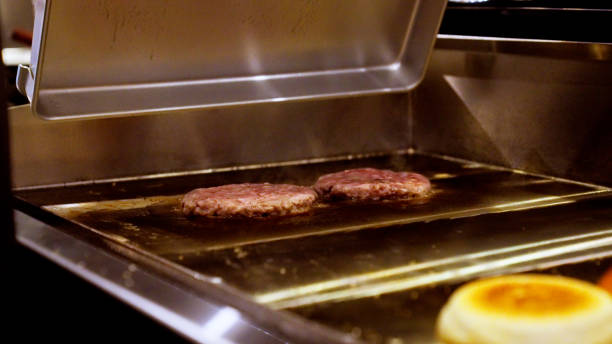 istock Japanese men are making hamburgers. 1411146201