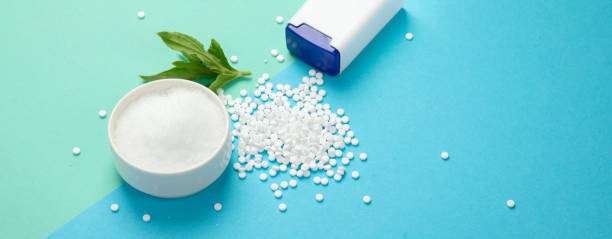 istock Sugar substitute on color background. 1411150152