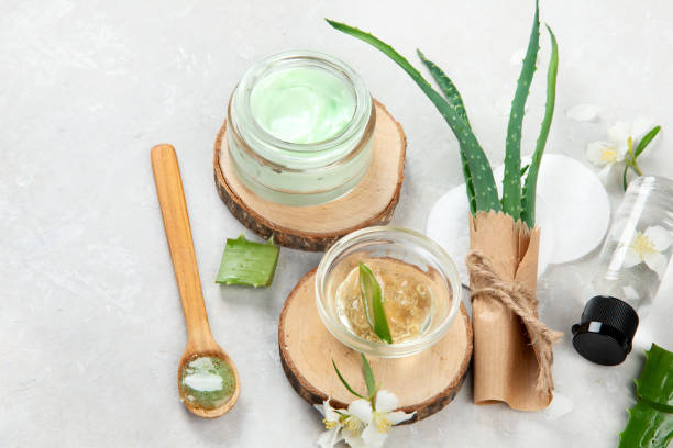 istock Aloe vera slices and moisturizer on a light background. 1411150247