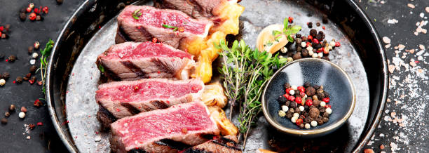 istock Grilled beef steak with pepper and salt. 1411150438