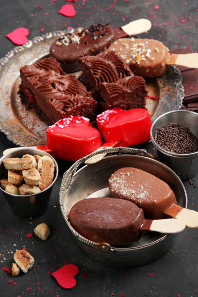 istock Chocolate desserts on dark background. 1411150625