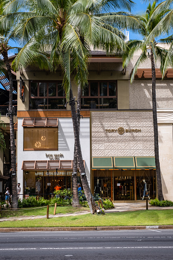 Honolulu, HI - April 29, 2022: The Kate Spade and Tory Burch Stores along Kalakaua Avenue in Waikiki.