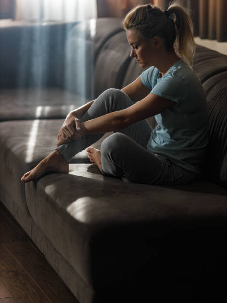 istock Pensive woman feeling lonely at home. 1411158481