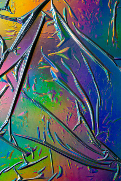 istock Glued colorful gradient holographic texture background. 1411159689