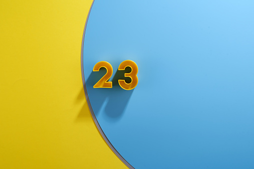 number 23 on blue and yellow background ,welcome year 2023