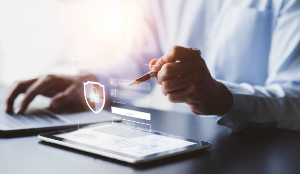 istock Businessman working on laptop computer show padlock protecting business and financial data, 2FA increases Cyber security and data protection information privacy internet technology concept. 1411166814