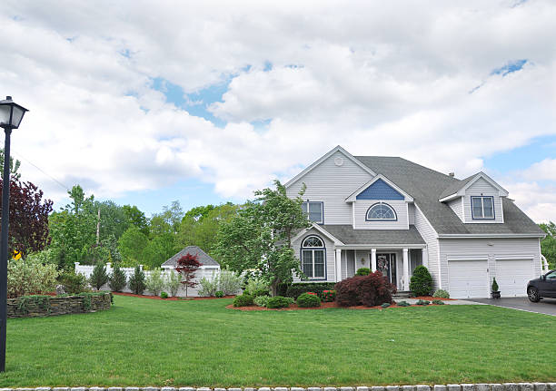 istock Suburban Two Car Garage Home 141116724