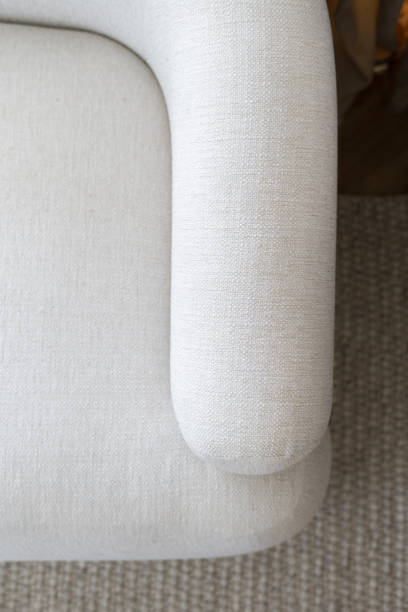 istock Grey soft couch details in living room 1411173133