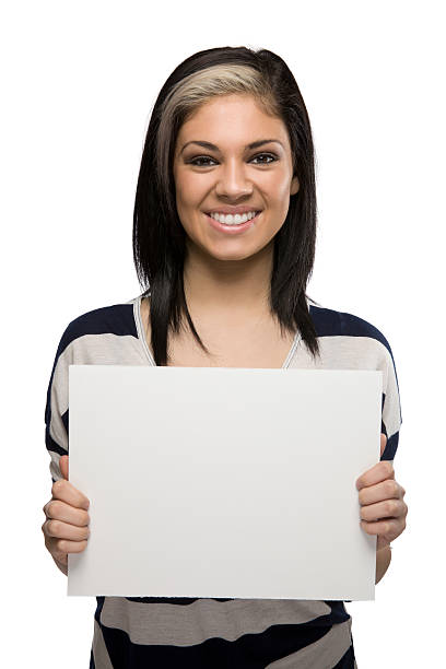 istock Smiling Woman Holding a Blank Sign 141117368