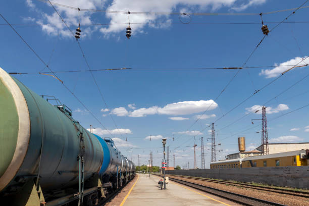 Rail tank cars used to transport petroleum products. Identification marks removed