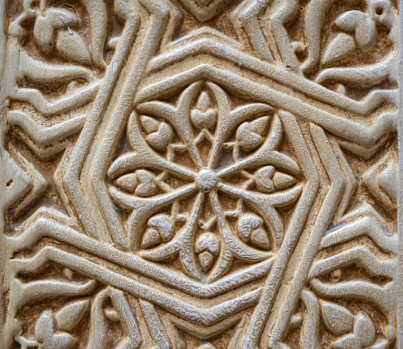 Bas-relief of Arab origin on a street in Granada, Spain