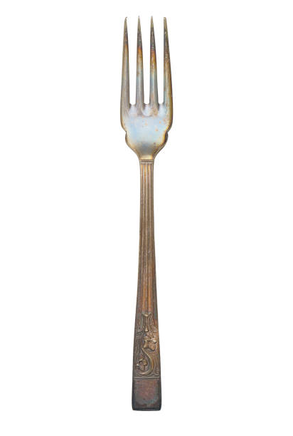 istock Old oxidized metal fork, cut out, photo stacking 1411178046