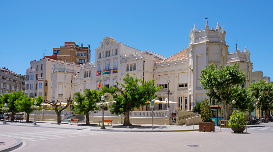 Huesca, Spain - June 28, 2022: The Navarra Square and the Circulo Oscense, in Huesca, Aragon, Spain. This modern art building, also known as Casino de Huesca, was built between 1901 and 1904