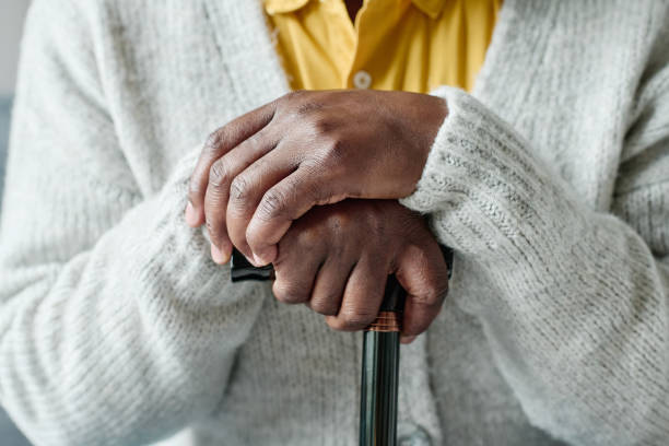 istock African senior man with stick 1411182532