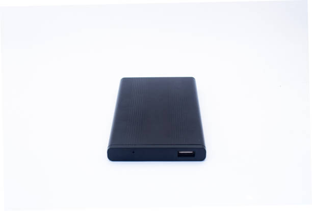 istock External or portable hard drive (HDD) for transfer or backup data. Isolated on white background. Selective focus, closeup 1411183447