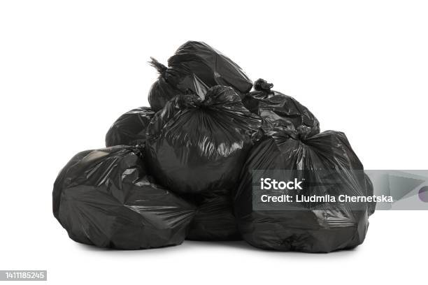 Black Trash Bags Filled With Garbage On White Background Stock Photo - Download Image Now