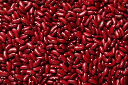 Top view of raw red kidney beans as background