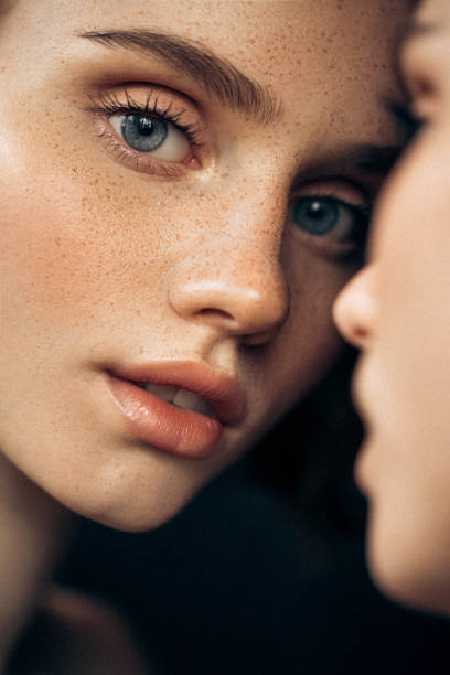 istock Beautiful woman and her reflection 1411186799