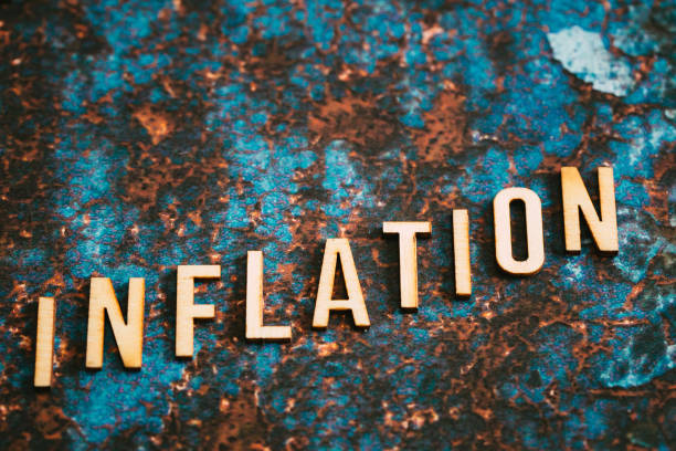 istock Wooden letters spelling the word 'Inflation' on textured surface 1411187398