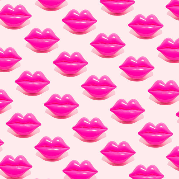 istock Creative pattern made with magenta lips figurine on pastel pink background. 80s or 90s romantic retro style aesthetic idea. Valentines day concept with kisses. 1411189601