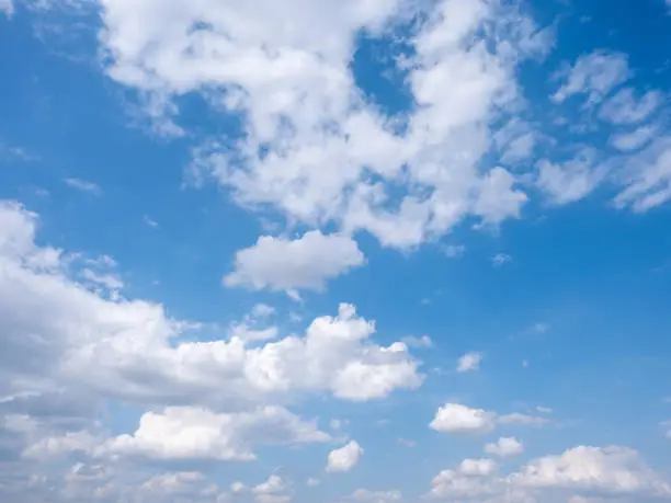 A blue sky with white clouds