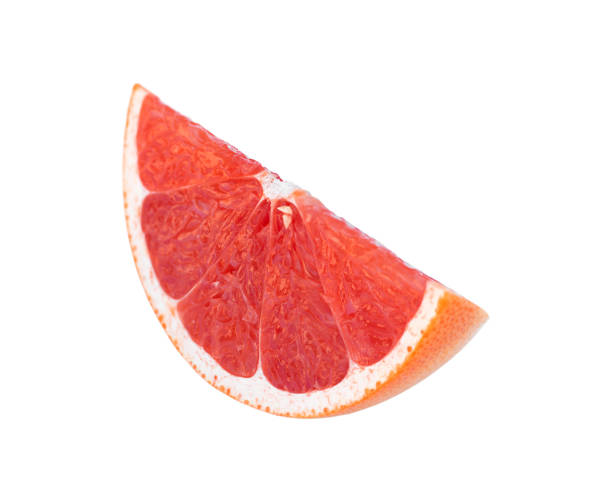 istock A piece of grapefruit isolated on a white background. 1411190932