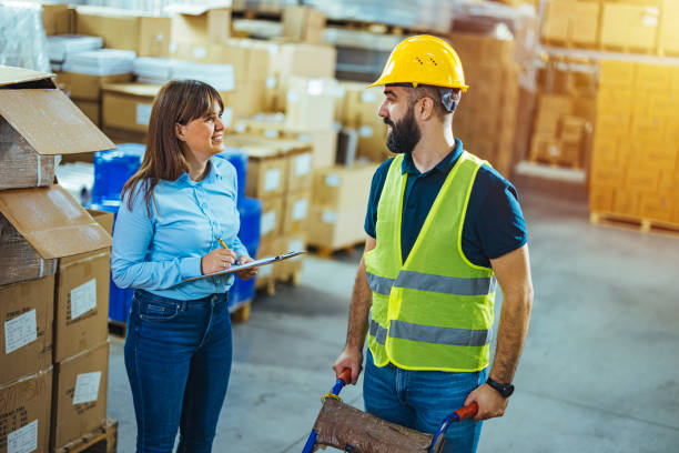 istock Male worker with female supervisor talking 1411192785