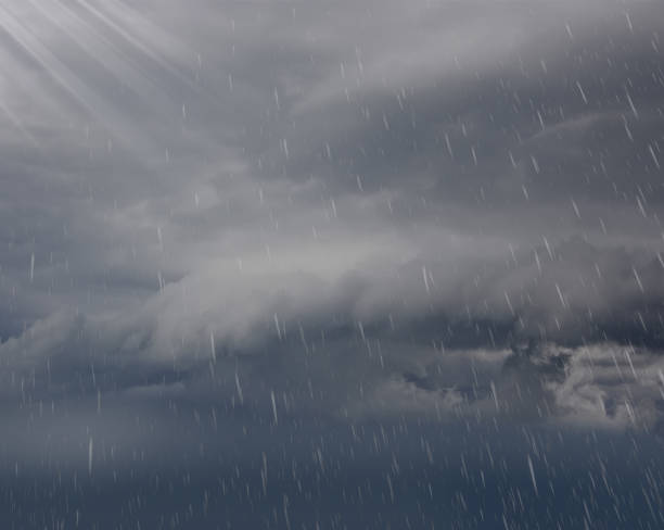 istock cloudy sky light rain rays of sunshine- 1411194491