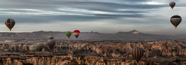 istock Hot air balloons flying on Goreme 1411196768