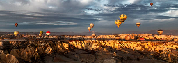 istock Hot air balloons flying on Goreme 1411196774