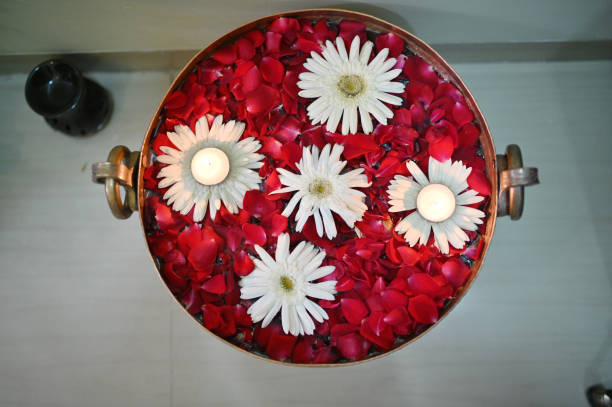 pattern of red pink white round circle paper scatter on the mat as background or wallpaper with copy space