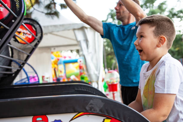 istock Shooting hoops at the traveling fair 1411202453