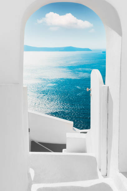 White architecture on Santorini island, Greece. White architecture on Santorini island, Greece. Summer seascape. View of the sea and the blue sky with white cloud. Travel and summer vacations concept cyclades islands stock pictures, royalty-free photos & images