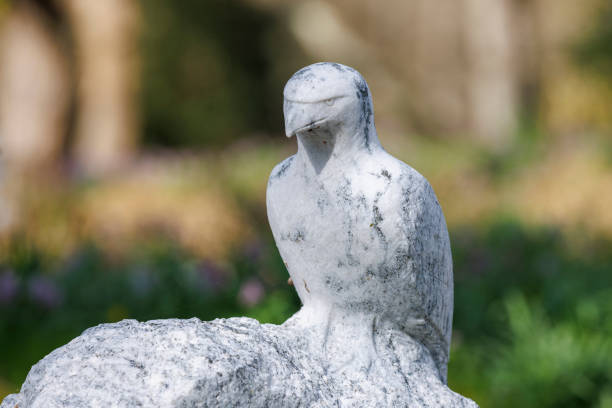 A stone statue of bird