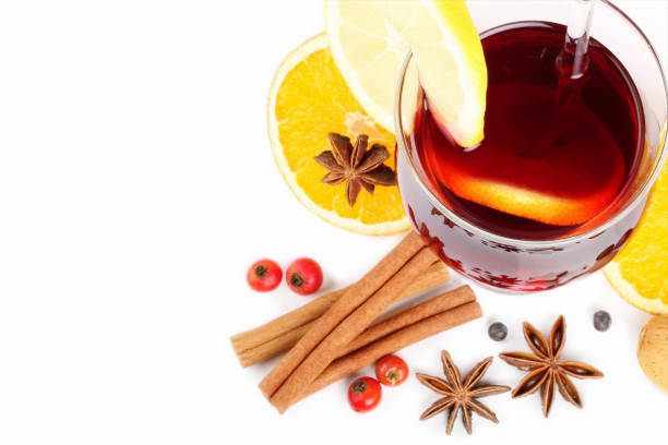 Mulled Wine with spices on white background - Copy space stock photo