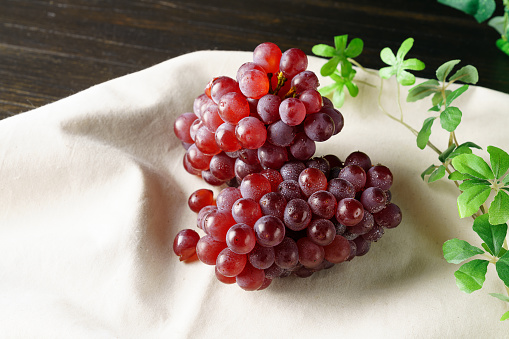 Fresh grapes on wooden table