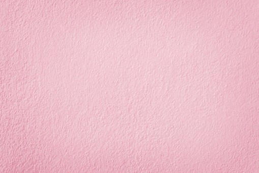 Pink concrete cement wall texture for background and design art work.