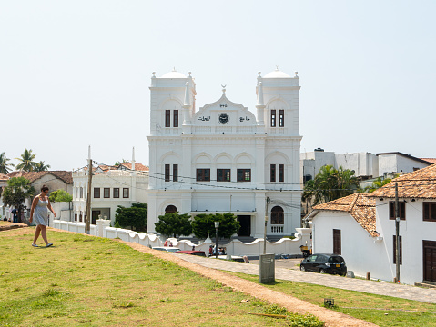 Galle, Sri Lanka - March 12, 2022: View of the white stone mosque Meeran Jumma Masjid in Galle Fort.