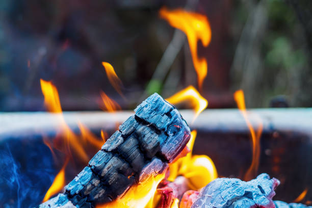 Flame of fire and coals in a bonfire close-up