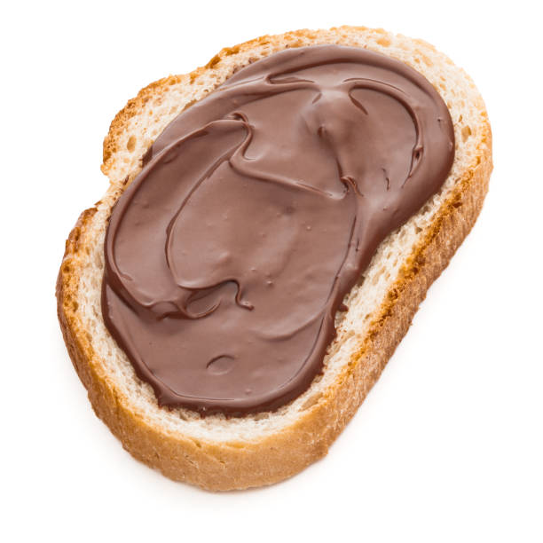 istock Bread with chocolate cream isolated on white background cutout 1411220651