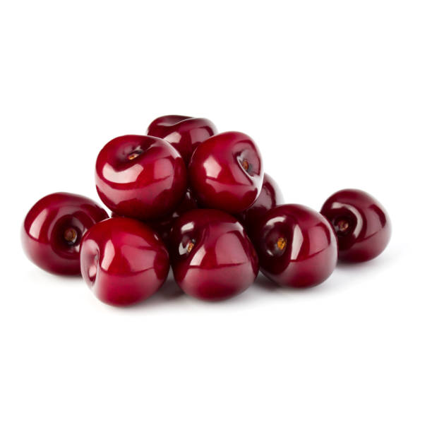 istock Sweet cherries pile isolated on white background 1411220691