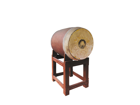 Big old vintage asian drum , selected on white background