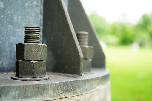 Fasteners - screws and nuts on the base