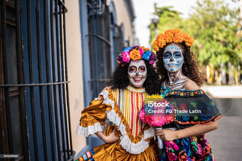 Portrait of a female friends celebrating the day of the dead outdoors Day Of The Dead Stock Photo